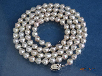 Akoya pearl necklace featuring 7-7.5mm pearls with an 83cm length displayed on a white background