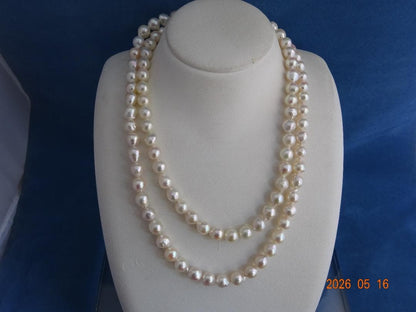 Akoya pearl necklace featuring 7-7.5mm pearls with an 83cm length displayed on a white background