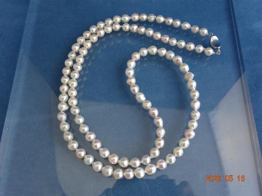 Akoya pearl necklace featuring 7-7.5mm pearls with an 83cm length displayed on a white background