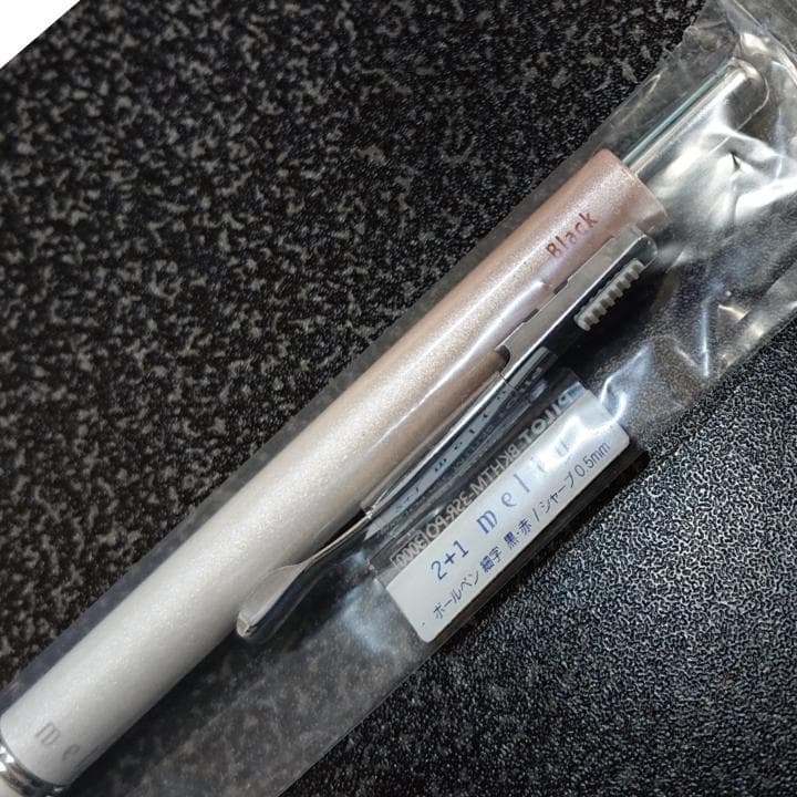 PILOT 2+1 Melty Pastel Orange multi-function pen with black and red ballpoint ink and 0.5mm mechanical pencil