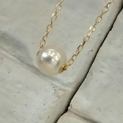 MIKIMOTO necklace with 7.1mm Akoya pearl on 42.5cm 18K yellow gold thread
