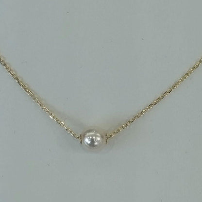 MIKIMOTO necklace with 7.1mm Akoya pearl on 42.5cm 18K yellow gold thread