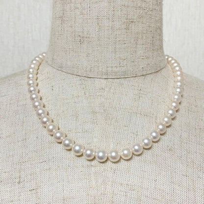Honmono Akoya pearl necklace with 7mm pearls and silver hardware, 43 cm length