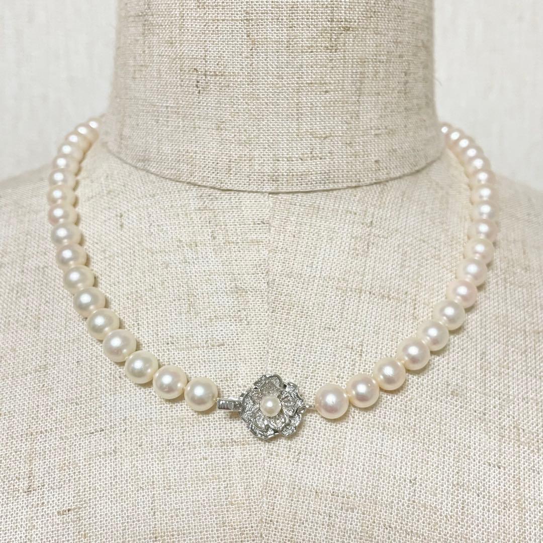Honmono Akoya pearl necklace with 7mm pearls and silver hardware, 43 cm length