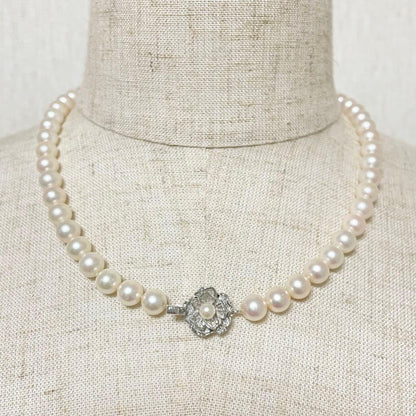 Honmono Akoya pearl necklace with 7mm pearls and silver hardware, 43 cm length