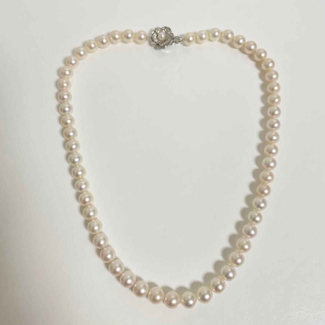 Honmono Akoya pearl necklace with 7mm pearls and silver hardware, 43 cm length