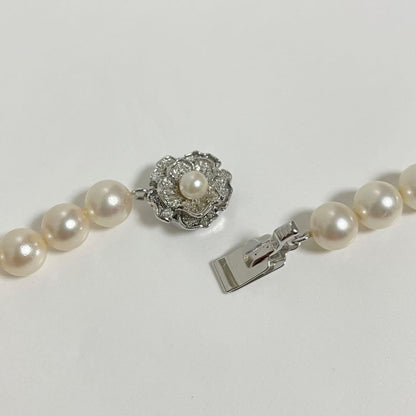 Honmono Akoya pearl necklace with 7mm pearls and silver hardware, 43 cm length