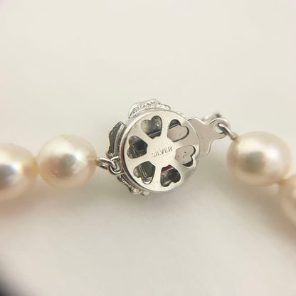 Honmono Akoya pearl necklace with 7mm pearls and silver hardware, 43 cm length