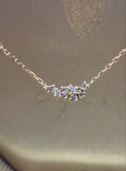Close-up of Agete 18k gold diamond necklace with adjustable 45 cm length
