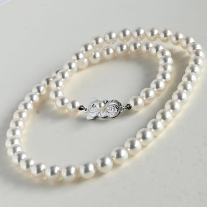 Mikimoto Akoya pearl necklace with round 7mm pearls and silver Aurora Hanadama pearl clasp