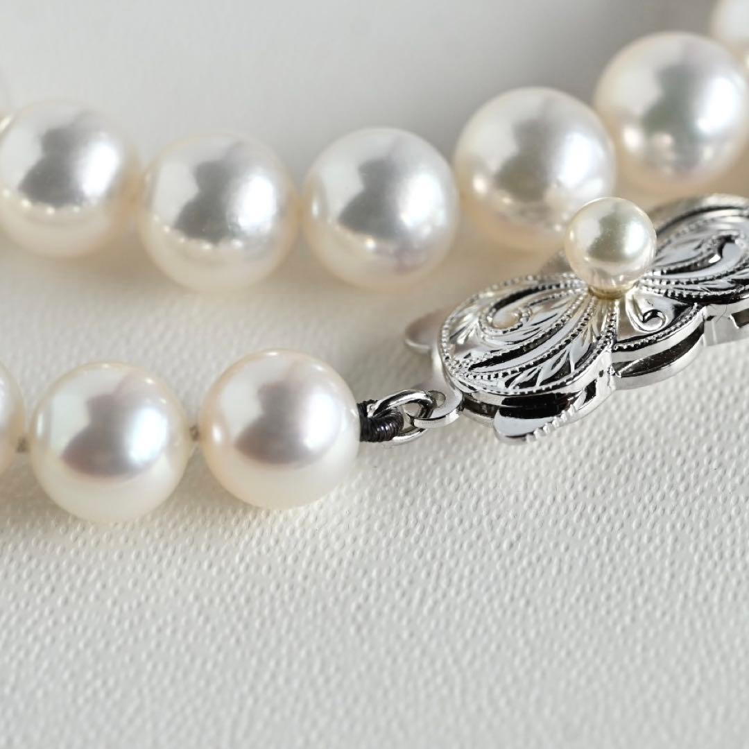 Mikimoto Akoya pearl necklace with round 7mm pearls and silver Aurora Hanadama pearl clasp