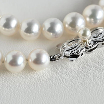 Mikimoto Akoya pearl necklace with round 7mm pearls and silver Aurora Hanadama pearl clasp