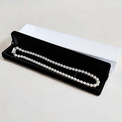 Mikimoto Akoya pearl necklace with round 7mm pearls and silver Aurora Hanadama pearl clasp