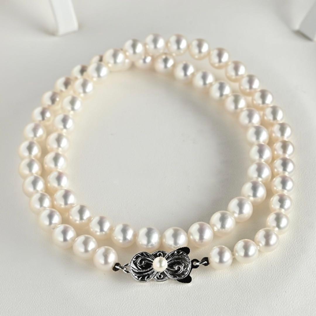 Mikimoto Akoya pearl necklace with round 7mm pearls and silver Aurora Hanadama pearl clasp
