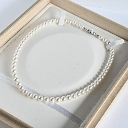 Mikimoto Akoya pearl necklace with round 7mm pearls and silver Aurora Hanadama pearl clasp