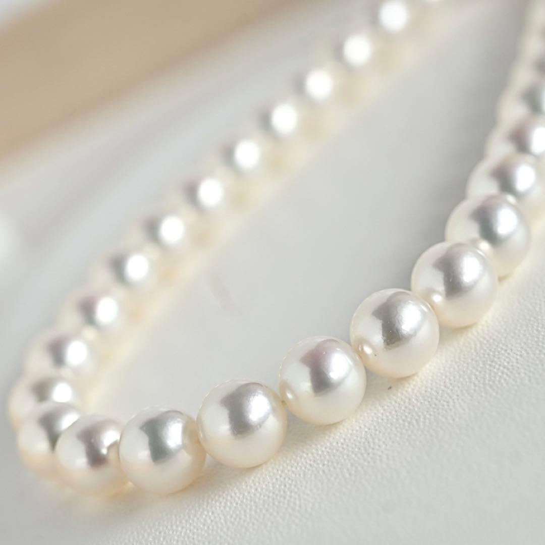Mikimoto Akoya pearl necklace with round 7mm pearls and silver Aurora Hanadama pearl clasp