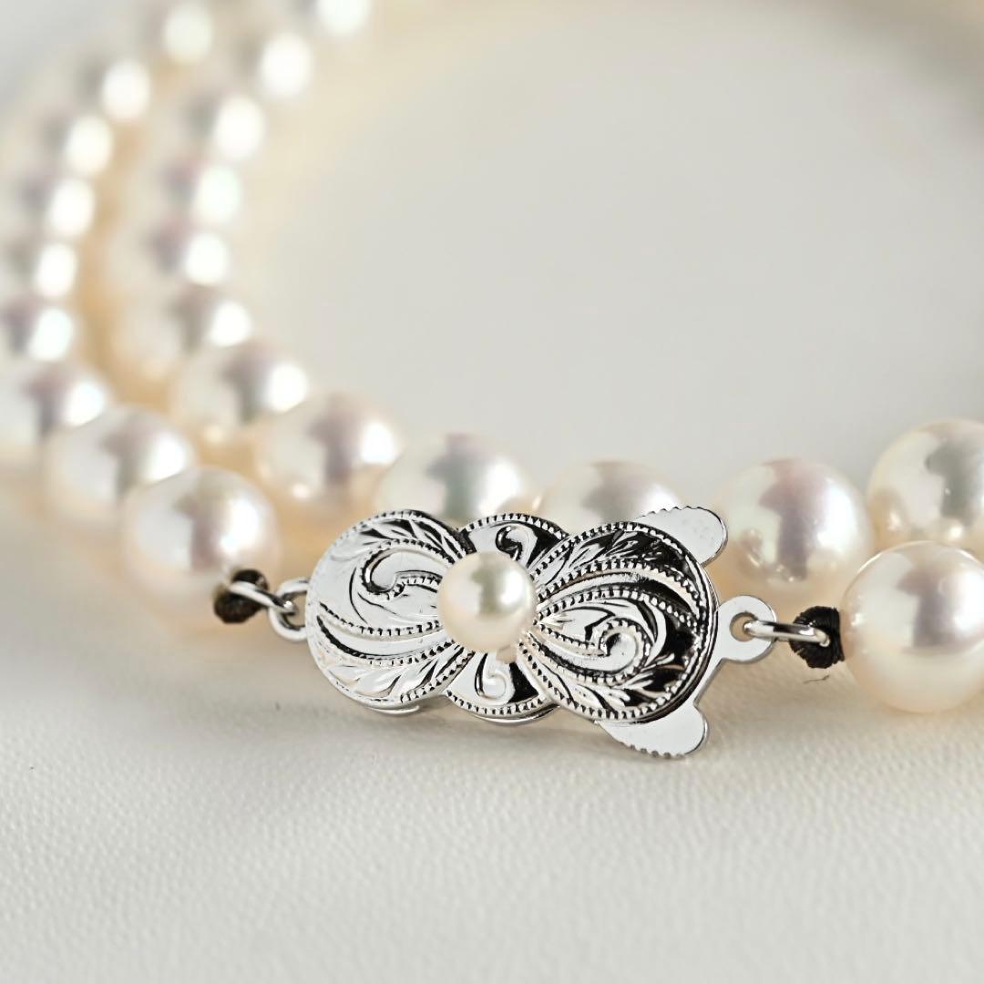 Mikimoto Akoya pearl necklace with round 7mm pearls and silver Aurora Hanadama pearl clasp