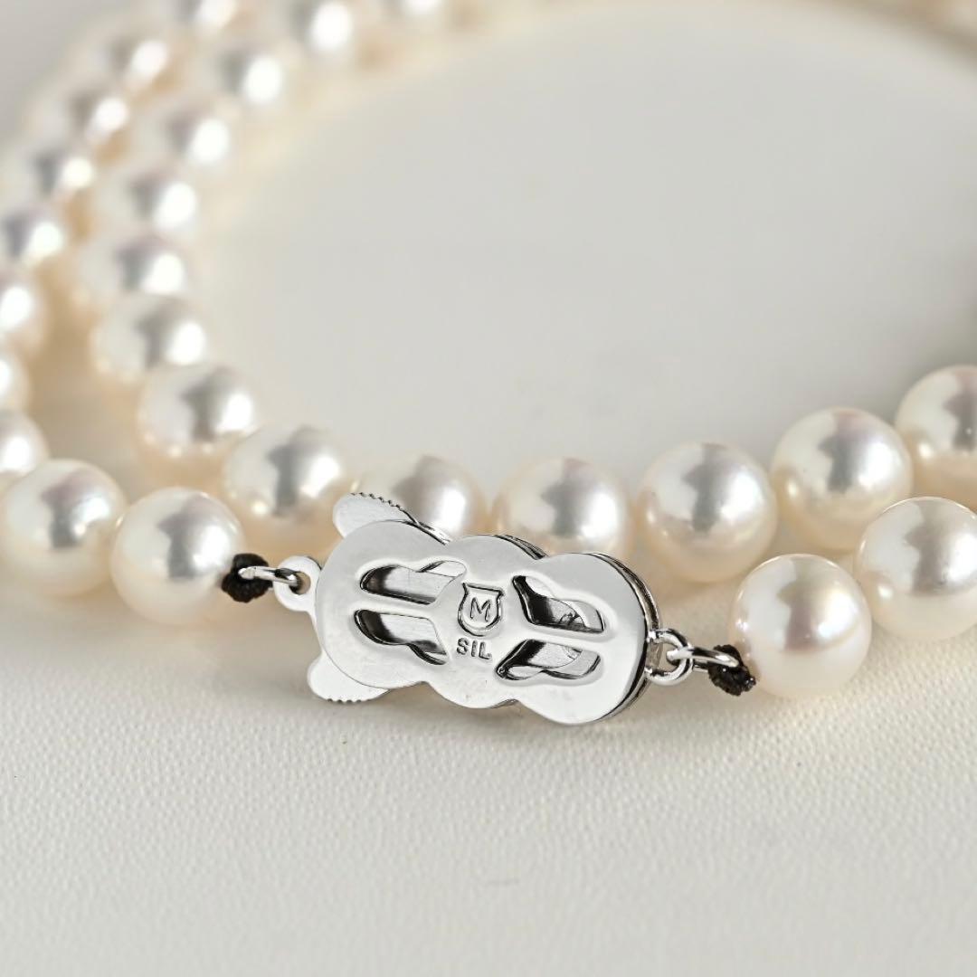 Mikimoto Akoya pearl necklace with round 7mm pearls and silver Aurora Hanadama pearl clasp