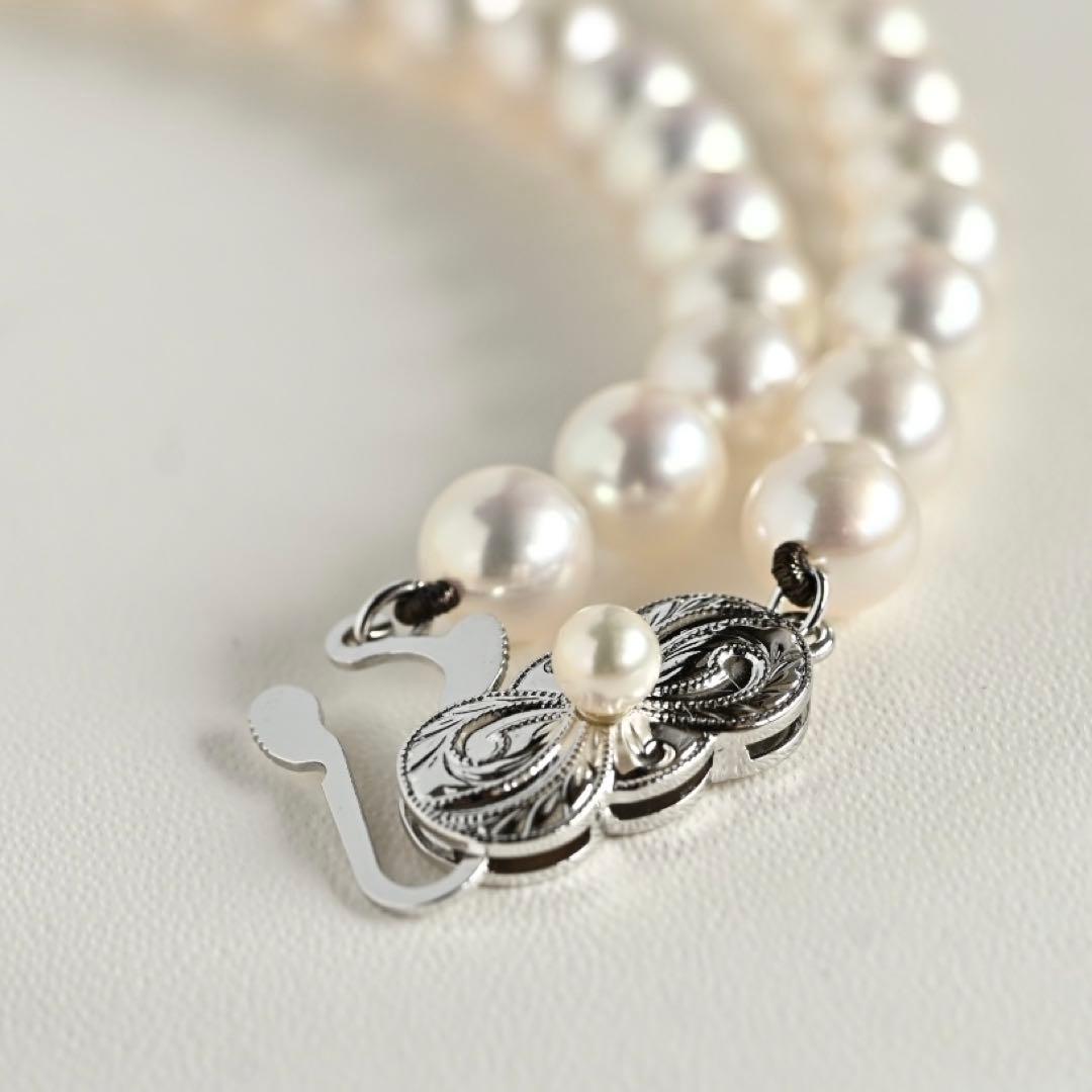 Mikimoto Akoya pearl necklace with round 7mm pearls and silver Aurora Hanadama pearl clasp