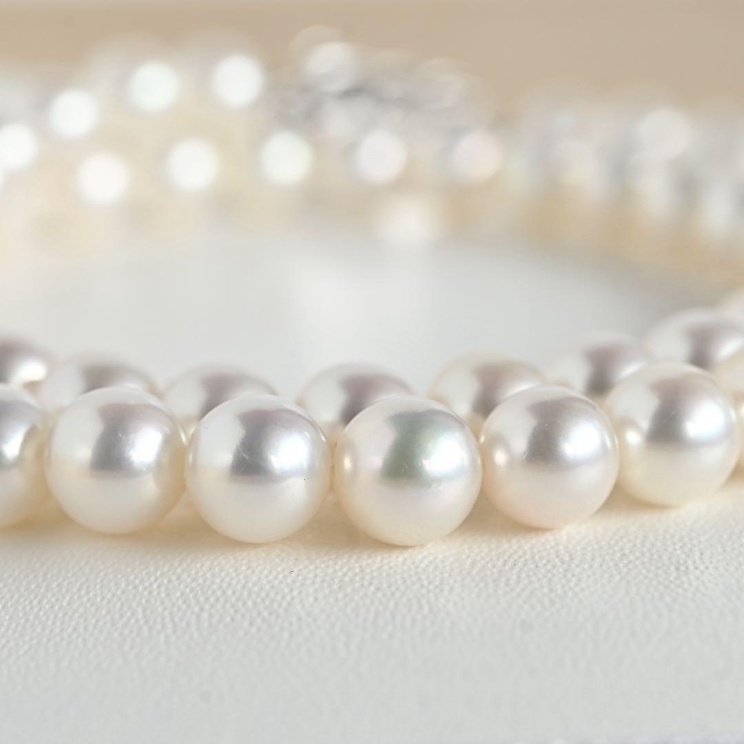 Mikimoto Akoya pearl necklace with round 7mm pearls and silver Aurora Hanadama pearl clasp