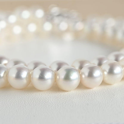 Mikimoto Akoya pearl necklace with round 7mm pearls and silver Aurora Hanadama pearl clasp