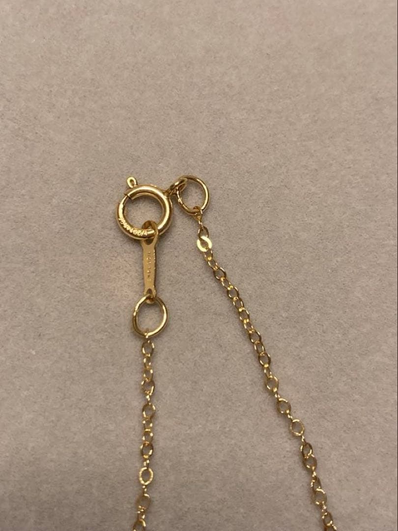 14KGF Akoya pearl necklace featuring a single 8mm pearl on a 42.5cm gold filled chain with clasp and 14K mark