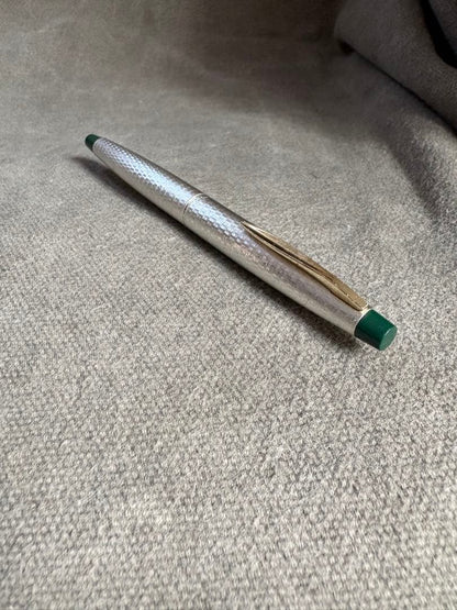 Pilot 14k 585 fountain pen with silver grid pattern body and green accents showing slight dent