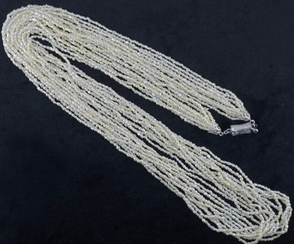 Akoya pearls 10-strand Kashiwake necklace 73cm long with cream tone pearls and silver clasp