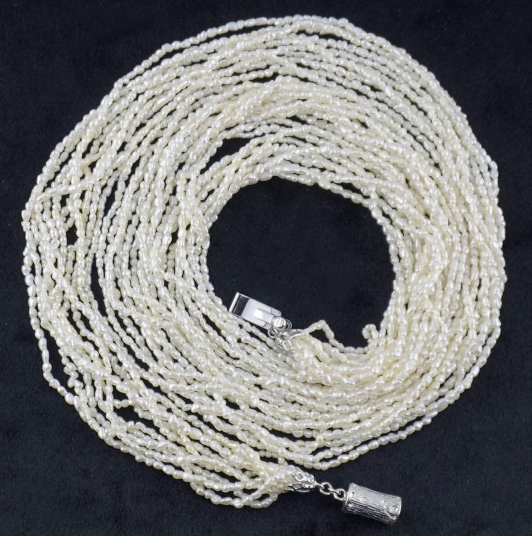 Akoya pearls 10-strand Kashiwake necklace 73cm long with cream tone pearls and silver clasp