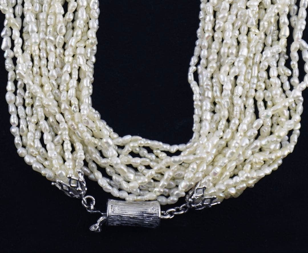 Akoya pearls 10-strand Kashiwake necklace 73cm long with cream tone pearls and silver clasp