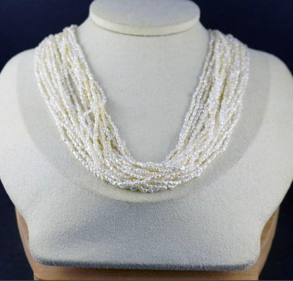 Akoya pearls 10-strand Kashiwake necklace 73cm long with cream tone pearls and silver clasp