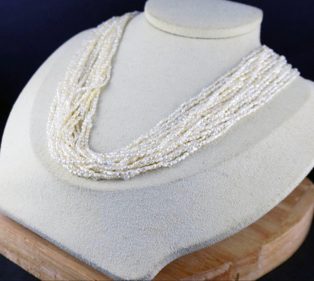 Akoya pearls 10-strand Kashiwake necklace 73cm long with cream tone pearls and silver clasp