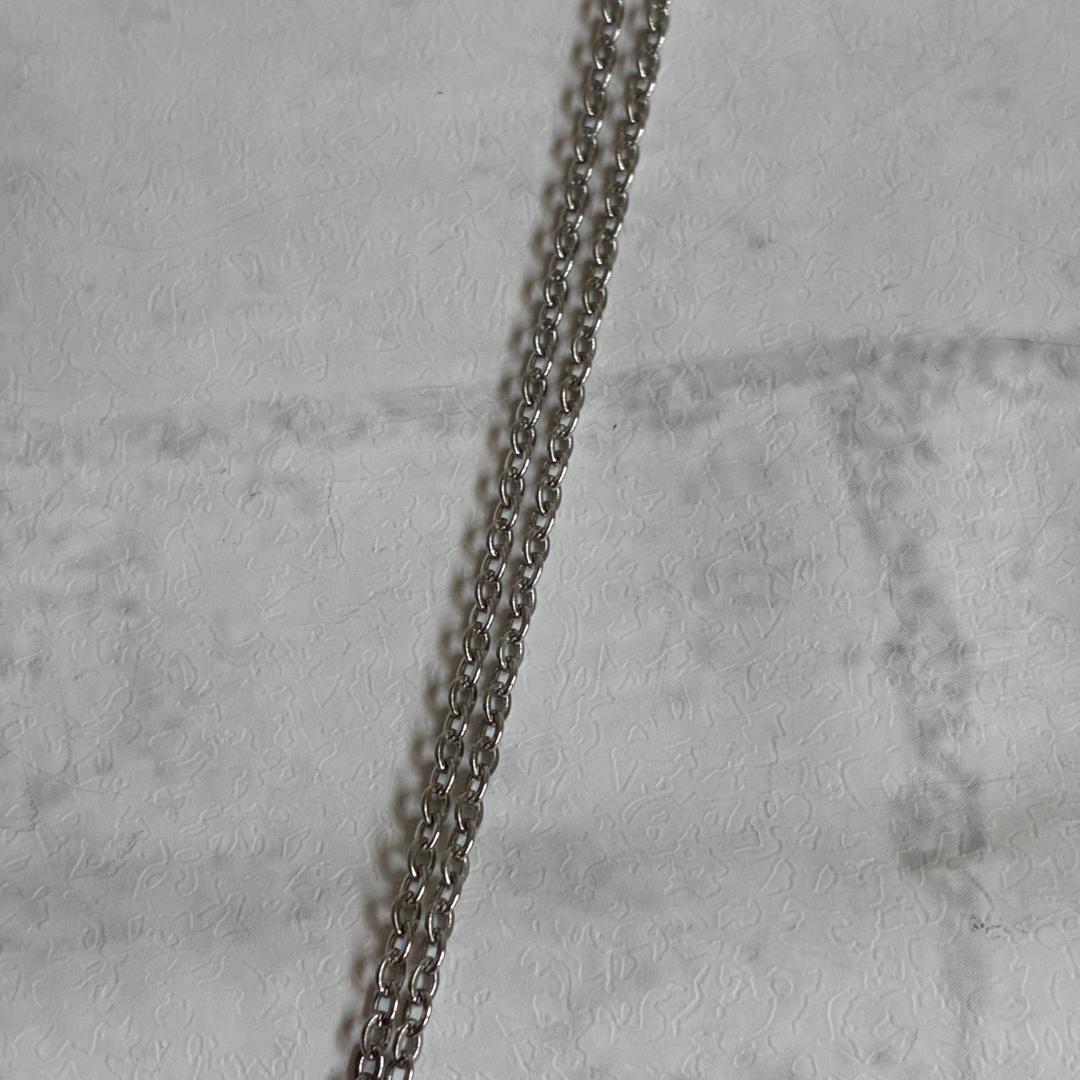 Mikimoto necklace featuring a large 0.8 cm Akoya pearl with silver motif and 59 cm silver chain