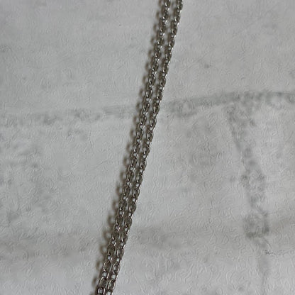 Mikimoto necklace featuring a large 0.8 cm Akoya pearl with silver motif and 59 cm silver chain