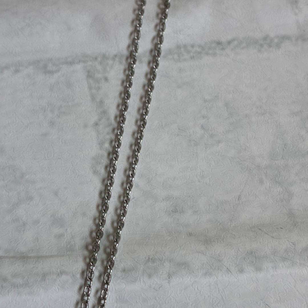 Mikimoto necklace featuring a large 0.8 cm Akoya pearl with silver motif and 59 cm silver chain