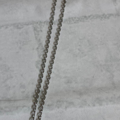 Mikimoto necklace featuring a large 0.8 cm Akoya pearl with silver motif and 59 cm silver chain
