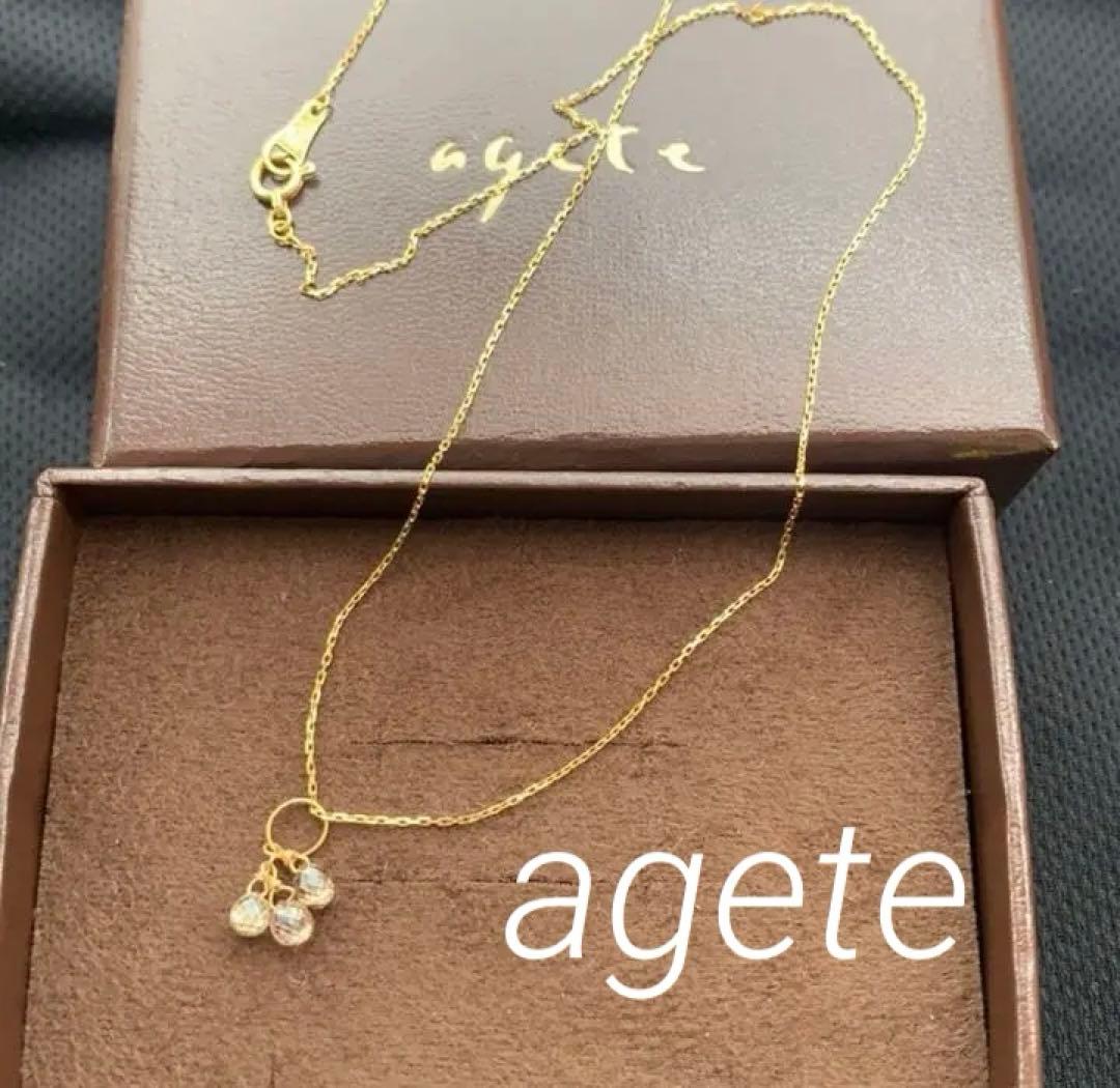 Aget Necklace featuring a finely cut brown diamond set in K18 gold with a delicate shine