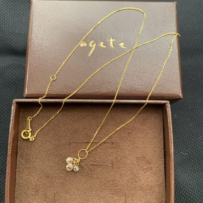 Aget Necklace featuring a finely cut brown diamond set in K18 gold with a delicate shine