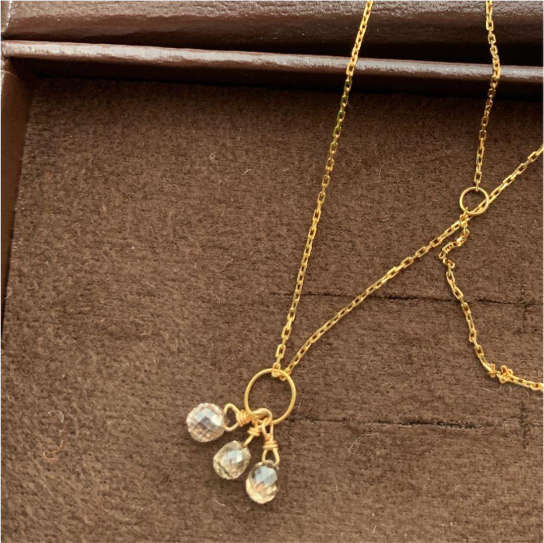 Aget Necklace featuring a finely cut brown diamond set in K18 gold with a delicate shine
