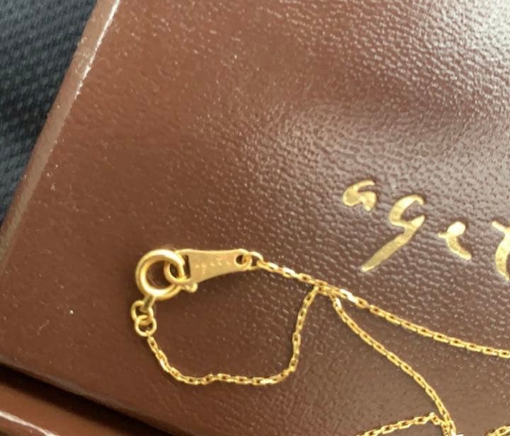 Aget Necklace featuring a finely cut brown diamond set in K18 gold with a delicate shine