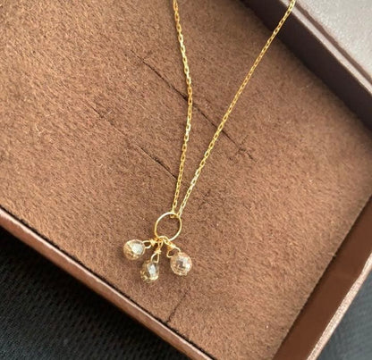 Aget Necklace featuring a finely cut brown diamond set in K18 gold with a delicate shine
