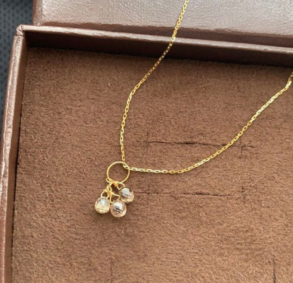 Aget Necklace featuring a finely cut brown diamond set in K18 gold with a delicate shine