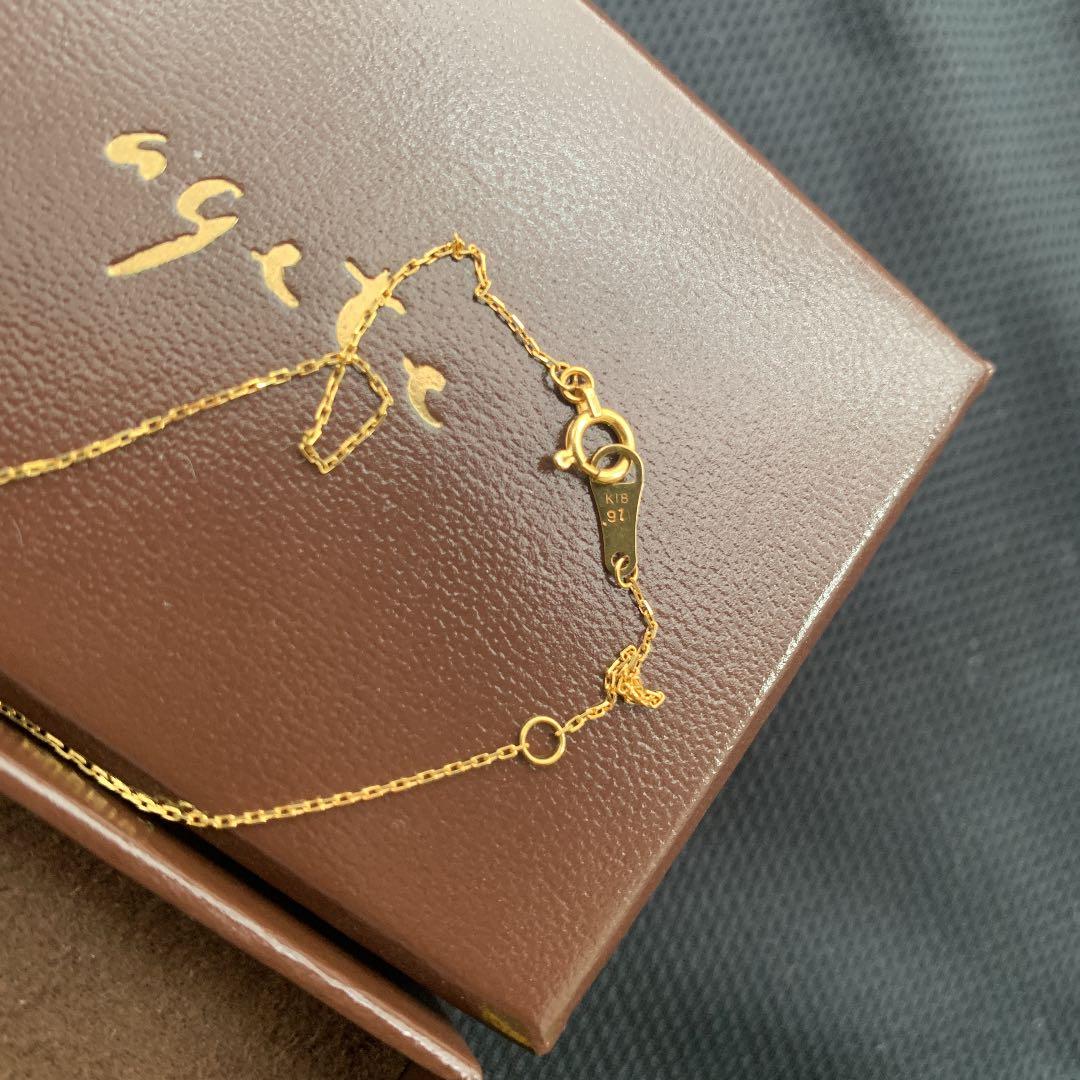 Aget Necklace featuring a finely cut brown diamond set in K18 gold with a delicate shine