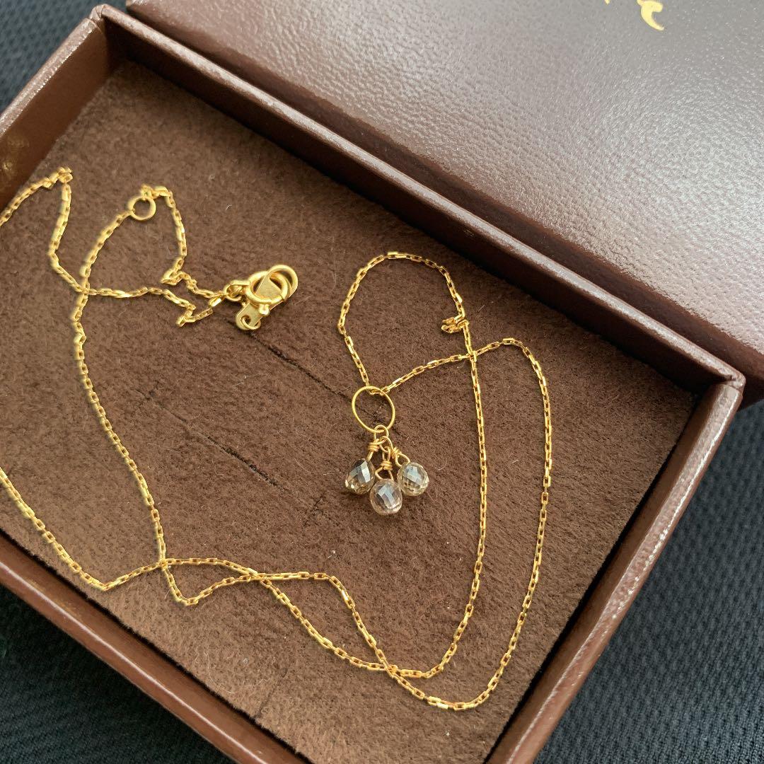 Aget Necklace featuring a finely cut brown diamond set in K18 gold with a delicate shine