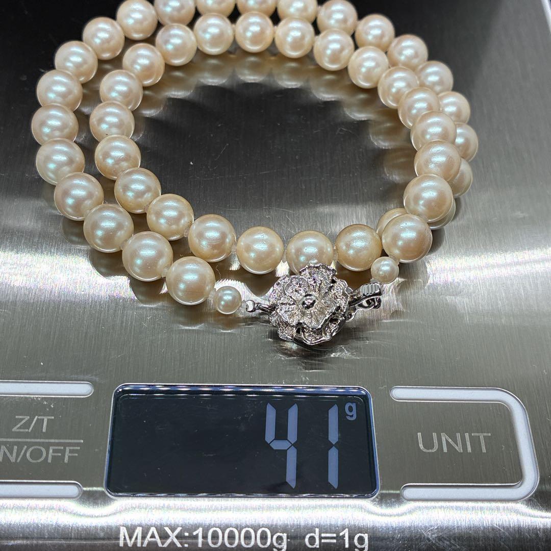 Akaoya True Pearl Necklace with 43 cm length and lustrous white pearls on a clean background