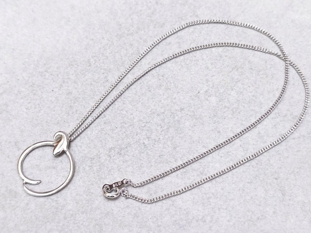 Mikimoto Circle Silver Necklace with a circle pendant on a 43 cm silver chain
