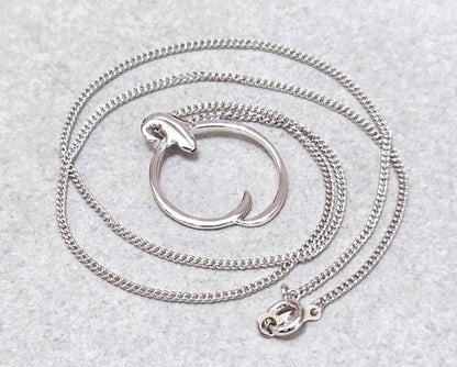 Mikimoto Circle Silver Necklace with a circle pendant on a 43 cm silver chain