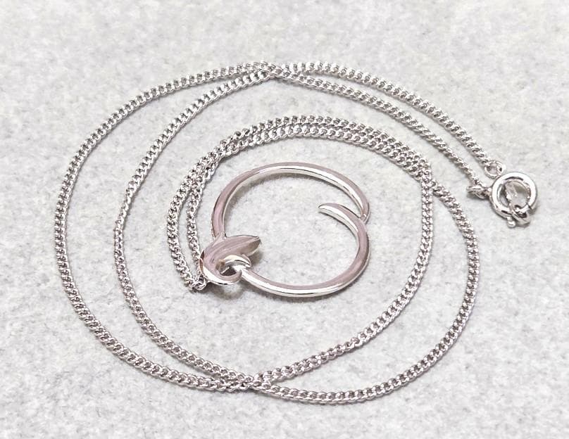 Mikimoto Circle Silver Necklace with a circle pendant on a 43 cm silver chain
