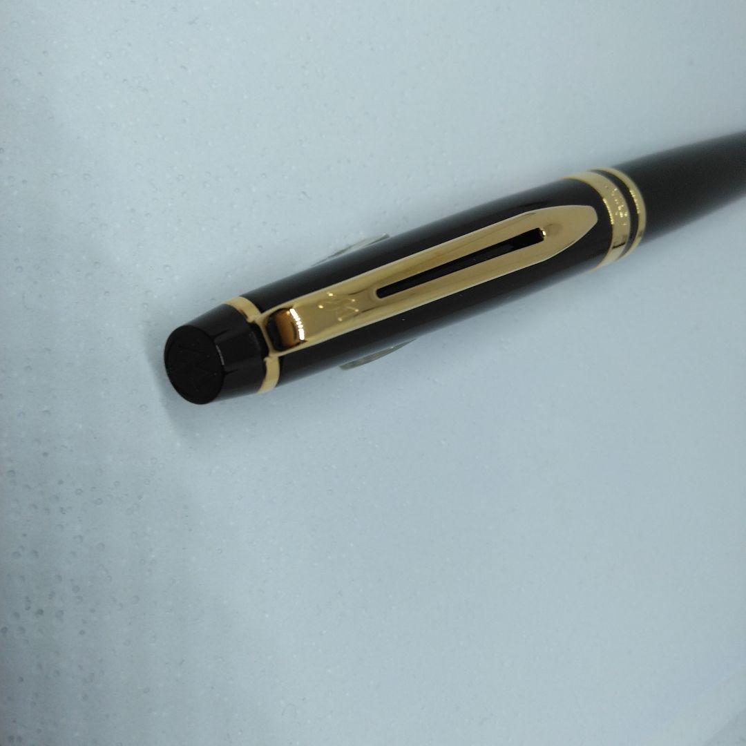 Waterman Expert Black GTBP ballpoint pen with metal black body and gold accents shown with dedicated case