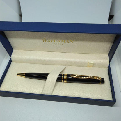 Waterman Expert Black GTBP ballpoint pen with metal black body and gold accents shown with dedicated case